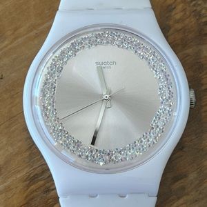 Light pink Swatch Watch, barely worn, with original box.